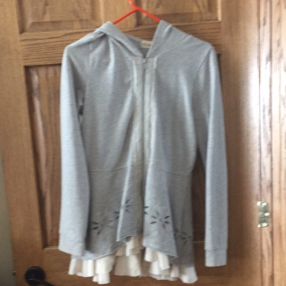 Tiered peplum zip front sweatshirt